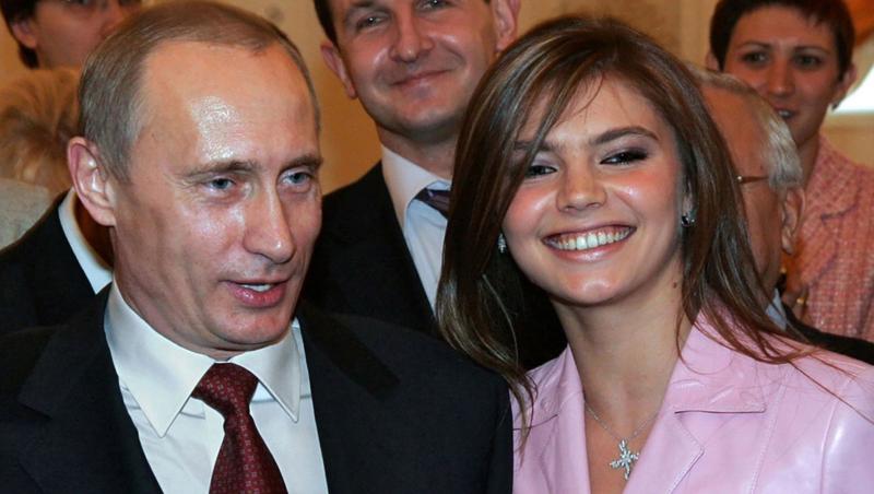 vladimir putin și presupusa amantă, alina kabaeva, îmbrăcată într-o ținută roz